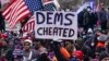 FILE - In this Jan. 6, 2021 photo, Trump supporters gather outside the Capitol in Washington.
