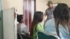Pasangan Lesbian yang Ditangkap Satpol PP Kota Padang. Dari kanan ke kiri: PI (jaket biru) dan AL (baju hijau) ketika berada di Kantor Satpol PP Kota Padang (foto Courtesy Istimewa)