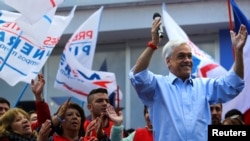 FILE - Chilean conservative presidential candidate Sebastian Pinera delivers a speech during a campaign rally in Santiago, Chile, Sept. 20, 2017.