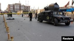 Arhova - Vojno vozilo iračkih bezbednosnih snaga na mestu samoubilačkog napada u Kirkuku, Irak, 5. novembra 2017.