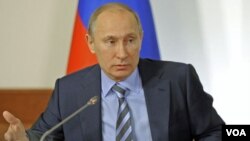 PM Rusia Vladimir Putin menghadiri pertemuan Front Populer Rusia, yang menjadi wadah para pendukungnya di Moskow (27/12).