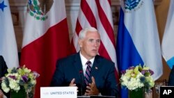 អនុប្រធានាធិបតី​ Mike Pence ថ្លែង​នៅ​ក្នុង​ក្រសួង​ការបរទេស​កាលពី​ថ្ងៃពី​ថ្ងៃទី​១១ ខែតុលា ឆ្នាំ ២០១៨ រដ្ឋ​ធានី​វ៉ាស៊ីនតោន។