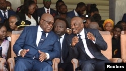 Le président de la RDC, Félix Tshsiekedi et son prédécesseur Joseph Kabila, à droite au Palais de la nation, Kinshasa, 24 janvier 2019.