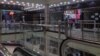 Stores were open in a shopping mall in Baneh, Iran, May 18, 2018, but it was virtually deserted of customers who have stayed away from the city. Local residents blame the lack of business on Tehran’s monthslong blockade of border footpaths, which Baneh shopkeepers have relied upon to import desirable goods from Iraq.