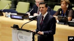 Mexico's President Enrique Peña Nieto addresses the United Nations Summit for Refugees and Migrants, in the Trusteeship Council Chamber of the United Nations, Sept. 19, 2016. 