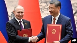 俄罗斯总统弗拉基米尔·普京周四（5月16日）在北京与中国国家主席习近平会晤并出席联合声明签署仪式。（媒体联访照片）
