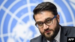 Penasihat Keamanan Afghanistan Hamdullah Mohib dalam konferensi pers di Jenewa, 28 November 2019. 