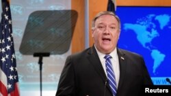 FILE - U.S. Secretary of State Mike Pompeo speaks during a media briefing at the State Department in Washington, May 6, 2020.