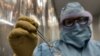 A technician shows a vial of the Cuban made COVID-19 vaccine called “Soberana 02” at the packaging processing plant of the Finlay Vaccine Institute in Havana, Cuba, Wednesday, Jan. 20, 2021. The director of the Finlay Institute said that Cuba hopes…