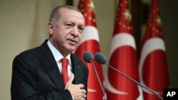 Presiden Turki Recep Tayyip Erdogan berbicara di Ankara, Selasa (29/10). 