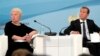 Russian Prime Minister Dmitry Medvedev and Olga Vasilyeva, the newly appointed Russian education and science minister attend an all-Russia meeting of teachers in Pskov, Aug. 20, 2016.