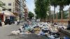 City Hall, Trash Collectors Reach Agreement Over Labor Benefits
