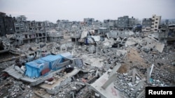 Houses destroyed in previous Israeli strikes lie in ruin, in Khan Younis in the southern Gaza Strip