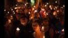 马里兰居民烛光守夜悼念枪击案死难者