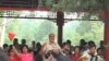 Chinese, Young and Old, Sing Communist Party’s Praises