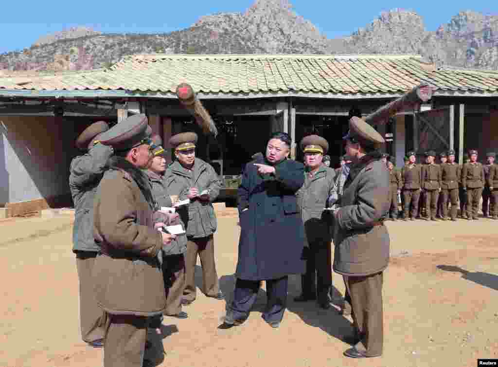North Korean leader Kim Jong Un visits a long-range artillery sub-unit of the Korean People's Army Unit 641, March 11, 2013. (KCNA)