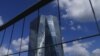 ECB Cuts Interest Rate, to Unveil More Stimulus 