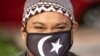 Malaysia Struggles to Shake COVID-19 as PM Quarantines, Challenges Mount  