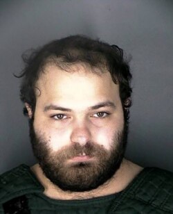 Ahmad Al Aliwi Alissa, de 21 años, residente de Arvada, en la foto de la ficha policial de Boulder, Colorado. Ha sido identificado por la policía como sospechoso del tiroteo en un supermercado que dejó 8 muertos. Marzo 23 de 2021.