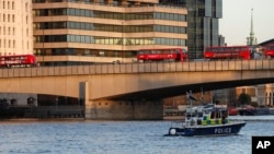 Kogin Thames da ya ratsa ta birnin London (AP Photo/Frank Augstein)