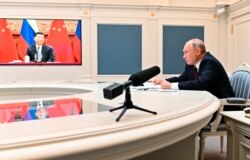 俄罗斯总统普京与中国领导人习近平举行视频对话。（2021年6月28日）