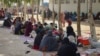 FILE - Afghan internally displaced families are pictured upon their arrival at a refugee camp in Kandahar, July 27, 2021. 