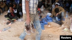 Des migrants africains à Zaouïa, Libye, le 1er juin 2014 