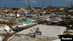 A child's bicycle is seen in a destroyed neighborhood in the wake of Hurricane Dorian in Marsh Harbour, Great Abaco, Bahamas, 