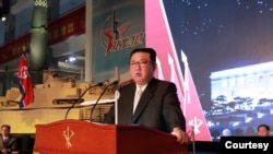 朝鲜朝中社2021年10月12日公布领导人金正恩在国防力量展上发表讲话