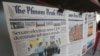 Local newspapers the Phnom Penh Post, left, and Khmer Times, right, are for sale at a newspaper's stand on a sidewalk near Monument Independence in Phnom Penh, Cambodia, Friday, Mach 1, 2024.