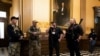 Michael John Null dan Willam Grant Null (kanan) tersangka dalam rencana penculikan gubernur negara bagian Michigan, di Lansing, 30 April 2020. Mereka didakwa pada 8 Oktober 2020.