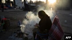 En el barro y el frío de un campamento improvisado en la ciudad fronteriza de Ciudad Juárez, muchos migrantes esperan ahí la oportunidad de solicitar asilo en Estados Unidos. Diciembre 2019.