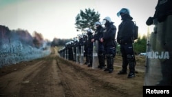 Poljska policija na granici sa Belorusijom (Foto: Policja Podlaska/Rojters)