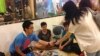 Student volunteers offer a free phone charging service at “Charging Corner” inside Hong Kong’s occupied central business district. The students have adapted a multi-USB powerboard, and can charge up to 80 telephones from one electric socket, Oct. 8, 2014.