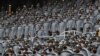 U.S. Army cadets wearing protective masks stand at Michie Stadium ahead of the annual Army-Navy collegiate football game, in West Point, New York, Dec. 12, 2020.