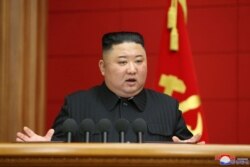 March 6, 2021 photo released by North Korea's official Korean Central News Agency (KCNA) shows North Korean leader Kim Jong Un speaking at First Short Course for Chief Secretaries of City and County Party Committees in Pyongyang.
