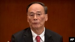 2017年10月18日，中纪委书记和政治局常委王岐山在中国共产党第十九次全国代表大会开幕式上。