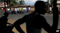 Demonstrators opposed to President Pierre Nkurunziza's bid for a third term in office, march in the Nyakabiga neighborhood of Bujumbura, Burundi, May 16, 2015.