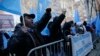 Uighurs and their supporters protest in front of the Permanent Mission of China to the United Nations in New York, March 15, 2018. 