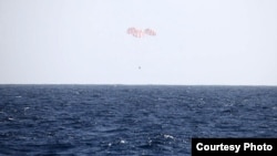 The privately-owned cargo spaceship Dragon returns to Earth Tuesday, after completing its mission at the International Space Station, Mar. 26, 2013. (SpaceX)