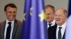 French President Emmanuel Macron, Polish Prime Minister Donald Tusk and German Chancellor Olaf Scholz arrive for a press conference at the Chancellery in Berlin on March 15, 2024. The three announced plans to use profits from frozen Russian assets to buy arms for Ukraine.