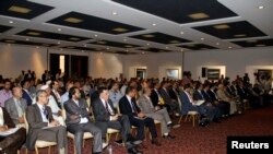 Lawmakers from Libya's newly-elected parliament are seen assembled in Tobruk, Aug. 2, 2014.