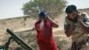 Libyan Forces Capture Parts of Key Gadhafi Stronghold