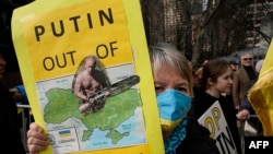 Protesters rally in a show of solidarity with Ukraine outside the United Nations in New York on Feb. 17, 2022.