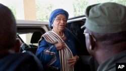 FILE - Liberia's President Ellen Johnson Sirleaf arrives at the Capitol to address lawmakers in Monrovia, Liberia, Sept. 29, 2014. 
