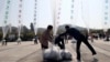 North Korean defectors prepare to release balloons carrying leaflets condemning North Korean leader Kim Jong Un and his government's policies, in Paju, near the border with North Korea, South Korea, Oct. 10, 2014. 