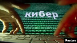 FILE - A computer screen displays cyber code in this picture illustration taken October 4, 2018. 