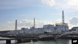 The badly damaged Tokyo Electric Power Co (TEPCO) Number 1 Daiichi nuclear power plant at Okuma town in Fukushima prefecture, March 31, 2011.