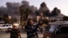 People shoot in the air as they celebrate the fall of the Syrian government in Damascus, Syria, Dec. 8, 2024.