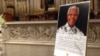 A large photo of Nelson Mandela was displayed near the main altar at the Riverside Church in New York during the late leader's memorial service, Dec. 11, 2013. (Adam Phillips/VOA)
